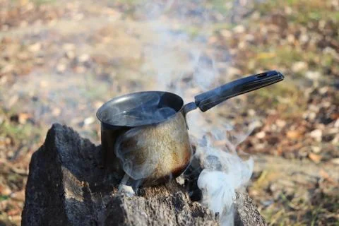 Boiling water on the fire Stockfoto's
