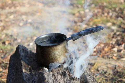Boiling water on the fire Stock Photos