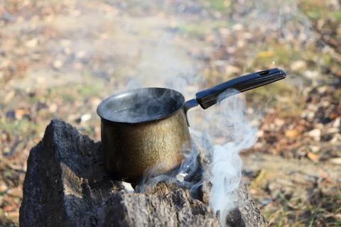 Boiling water on the fire Stock Photos