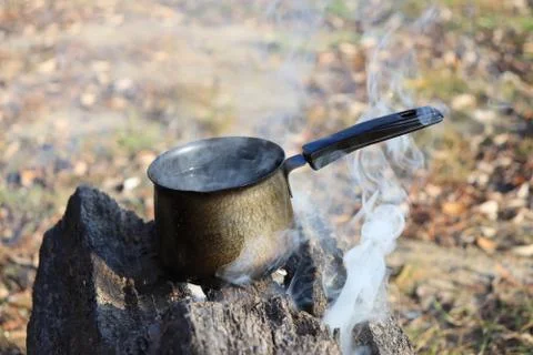 Boiling water on the fire Stock Photos