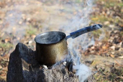 Boiling water on the fire Stock Photos