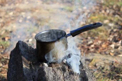 Boiling water on the fire Stock Photos