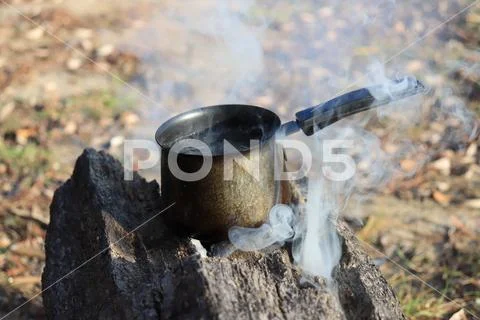 Boiling water on the fire Stock-Fotos