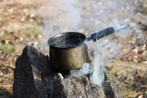 Boiling water on the fire Stockfoto's