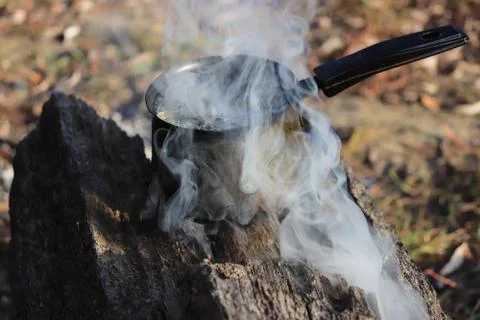 Boiling water on the fire Stock Photos