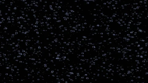 Boiling water gives off bubbles.Bubbles rising up. Boiling water, closeup Stockbeeldmateriaal 98608207