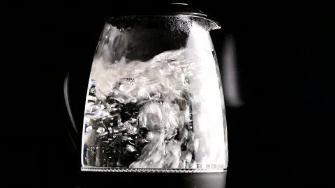 Boiling  water in a glass kettle Stock-Footage 148102779