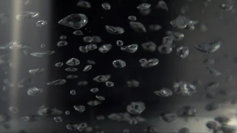 Boiling water in kettle / cell like shapes rising in slow motion 스톡 동영상 100844055