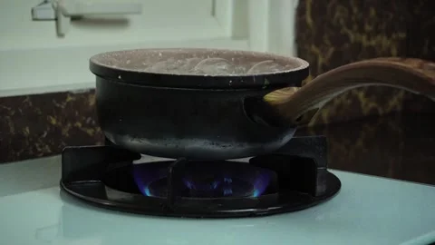 Boiling water in the kitchen Stock Footage 295673041