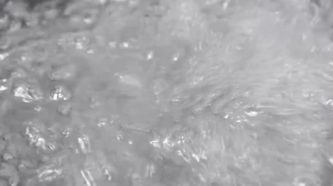 Boiling Water in a Pan Close Up Stock Footage 22958770