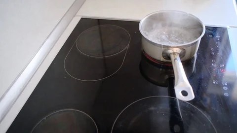 Boiling water in the pan Video stock 106460665