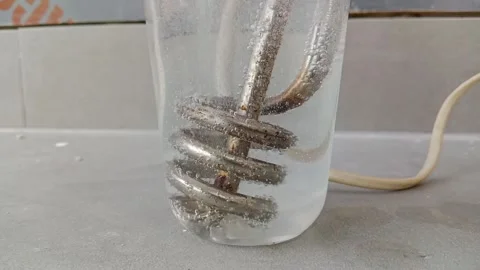 Boiling water in a plastic cup Stock Footage 317619334