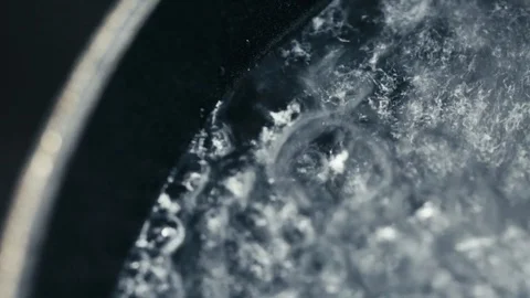 Boiling water in a pot Stock Footage 94959948