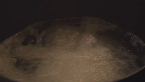 Boiling water in pot Stock Footage 144959412