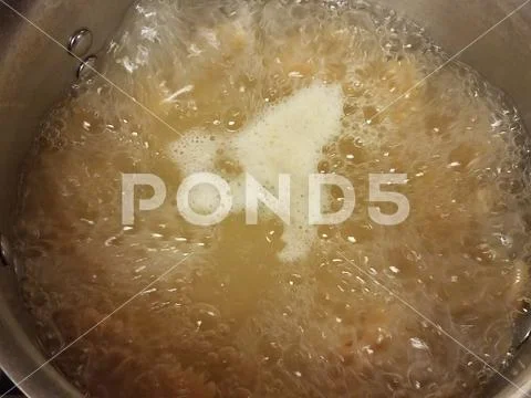Boiling water in a pot Stock Photos