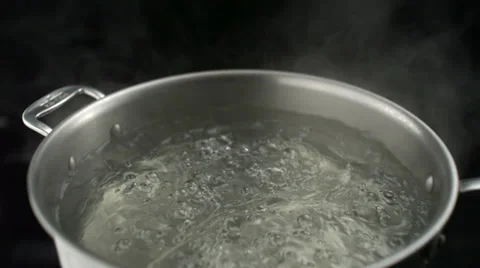 Boiling water in pot, Slow Motion Stock Footage 31819627