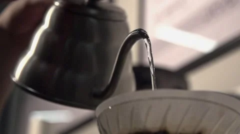 Boiling water is poured from the kettle Stock Footage 59006568