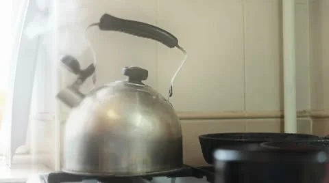 Boiling water is poured into a mug Stock Footage 10798523