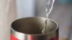 Pouring Hot Water Into Into Cup Stock Photo 1146657914