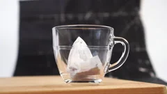 Pouring hot boiling water into cup or mu, Stock Video