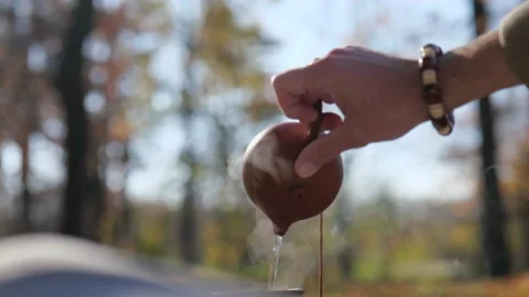 Boiling water pours epic from a clay teapot. chinese tea ceremony Stock Footage 229858454