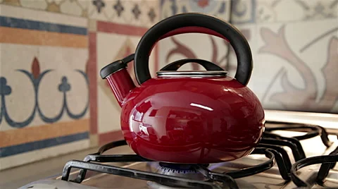 Boiling Water in Red Kettle Stock Footage 46718744