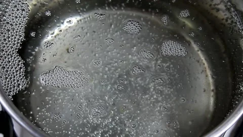 Boiling water in a saucepan Stock Footage 150406491