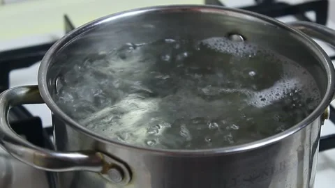 Boiling water in a saucepan Stock Footage 150406501