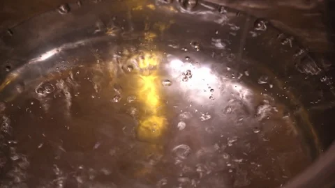Boiling water in a saucepan when it is salted Stock Footage 123860327