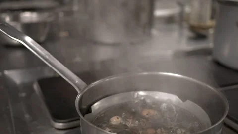 Boiling water in slow motion Stock Footage 86698090