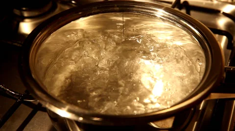 Boiling water in a stainless casserole Stock Footage 50361941