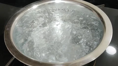 Boiling Water in steel vessel, e vaporization of water Stock Footage 160889073