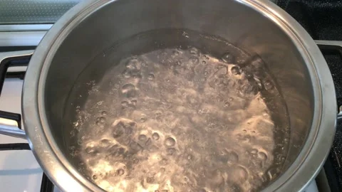 Boiling water on the stove Stock Footage 133429311