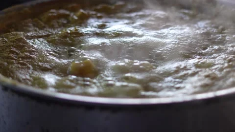 Boiling Water Surface with Bubbles Close-Up Stock Footage 333594968