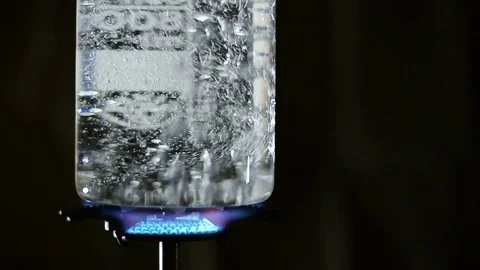 Boiling water in a transparent glass Stock Footage 78190325