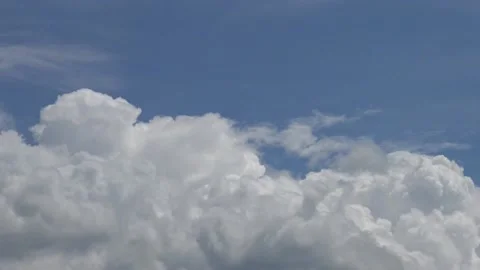 Boiling white clouds on blue sky Stock Footage 159075667