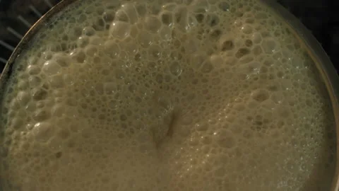 Boiling white sauce with foam is cooked on an electric stove 스톡 동영상 154148297