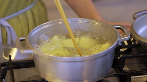Boiling whole potatoes in a pot close-up. Full HD. Stock Footage 328644639