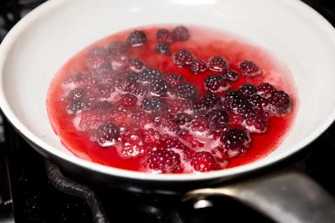 Boiling wild berries Stock Photos
