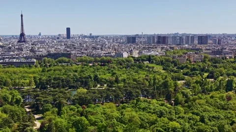 Bois de Boulogne with Eiffel Tower, Tour Montparnasse and La Défense, drone Stock Footage 338358924