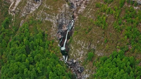 Boka Waterfall between steep cliffs near Triglav National, Slovenia Stock Footage 260731055