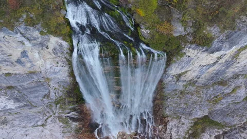 Boka waterfall cascading down rocky cliff in Slovenia Stock Footage 323396687