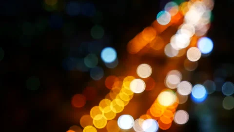 Bokeh abstract blurred background festive traffic yellow orange green red lights Stock Footage 274042135