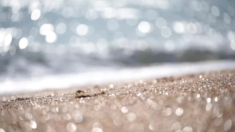 Bokeh abstract sea background of a summer ocean sunset with small waves on the Stock Footage 244372821