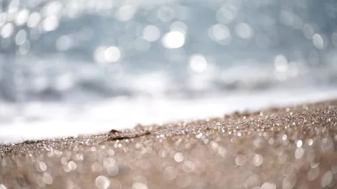Bokeh abstract sea background of a summer ocean sunset with small waves on the Stock Footage 244446865