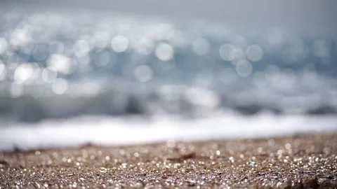 Bokeh abstract sea background of a summer ocean sunset with small waves on the Stock Footage 246272613
