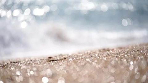 Bokeh abstract sea background of a summer ocean sunset with small waves on the Stock Footage 246956067