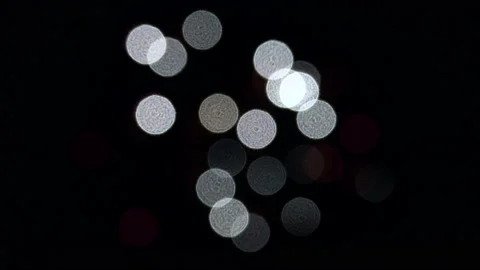 Bokeh and blur of fireworks exploding at night in the sky. Stock Footage 86298208