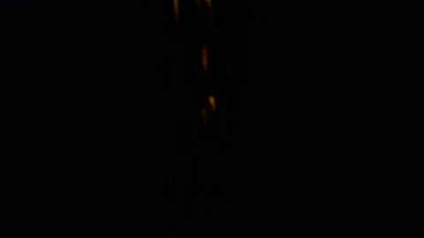 Bokeh and blur of fireworks exploding at night in the sky. Stock Footage 86298337