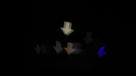 Bokeh Arrow Shapes spinning Stock-Footage 80176913